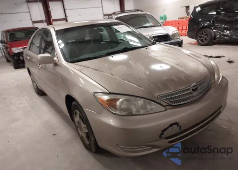 2002 Toyota Camry Le from USA, damaged, VIN 4T1BE32KX2U572131